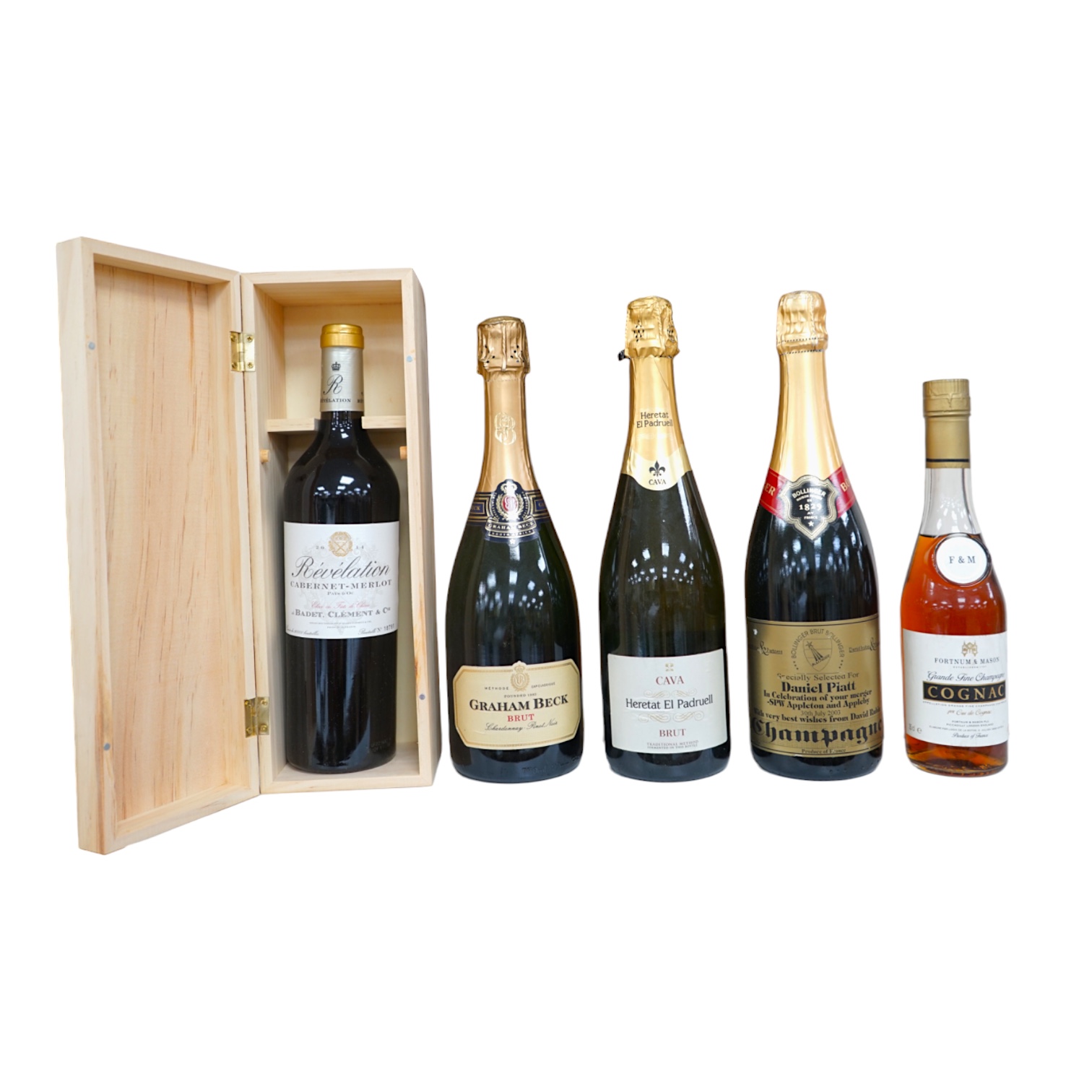 Five bottles; a Graham Beck Brut, a Heretat El Padruell Cava, a Bollinger champagne, a half bottle of Fortnum and Mason Cognac and a wooden bottle of Bevelation 2014 Merlot (5). Condition - good.